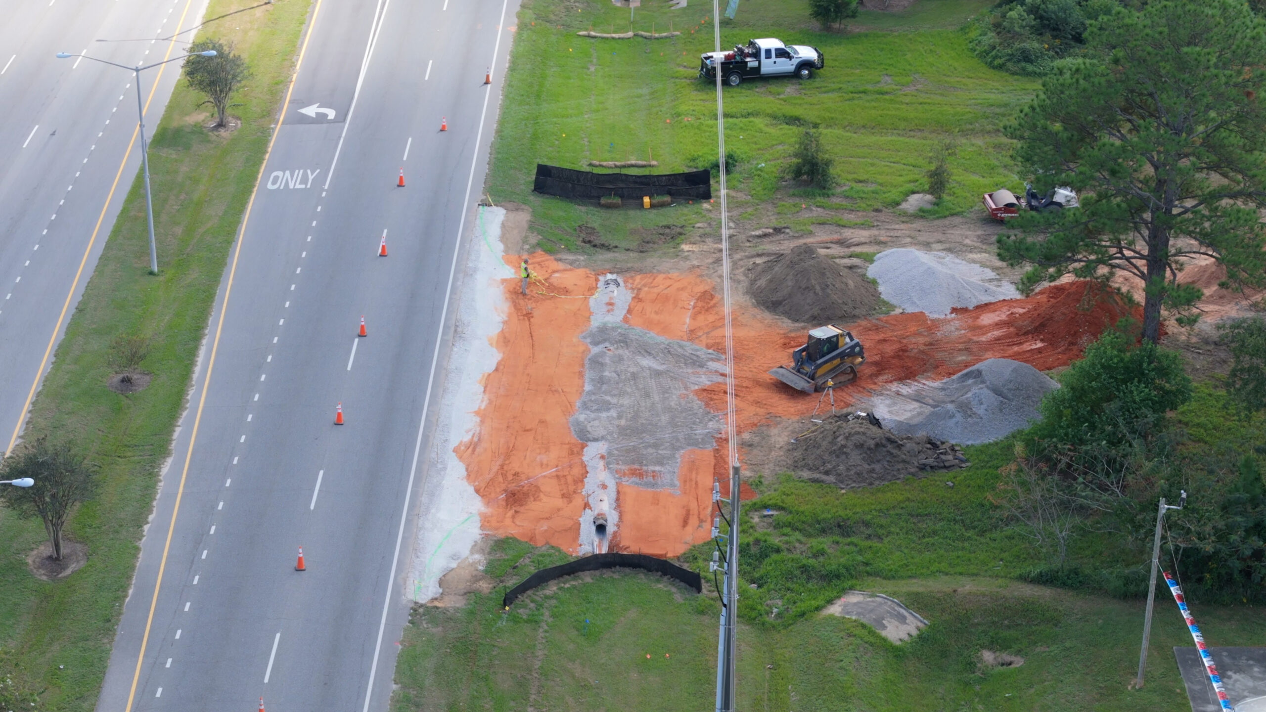 Aerial of road and dirt work in progress — Baldwin County